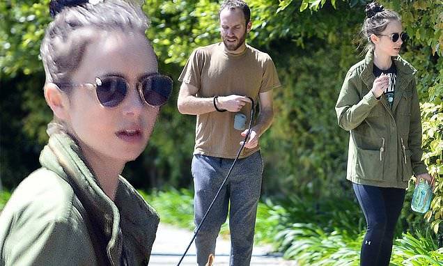 Tim Macgraw - Phil Collins - Lily Collins - Lily Collins and boyfriend Charlie McDowell take adorable pup Redford for walk in LA - dailymail.co.uk - Britain - city Sandra, county Bullock - county Bullock