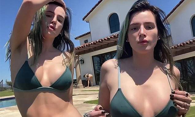 Bella Thorne - Bella Thorne slips into a tiny bikini as she dances by the pool during quarantine - dailymail.co.uk - state California - county Canyon