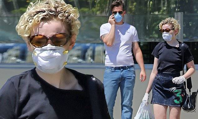 Ozark star Julia Garner and her musician husband Mark Foster stay safe with masks in Burbank - dailymail.co.uk - New York - state California - city Burbank, state California