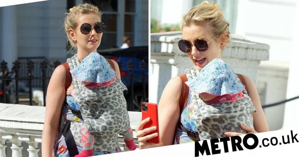 Rachel Riley - Rachel Riley proves she’s a pro at multi-tasking as she effortlessly cradles baby Maven while taking a video call on daily lockdown walk - metro.co.uk - Britain
