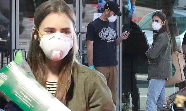 Emilia Clarke - Phil Collins - Lily Collins - Lily Collins and director beau Charlie McDowell mask up to pop out for supplies - dailymail.co.uk - Los Angeles - city Los Angeles