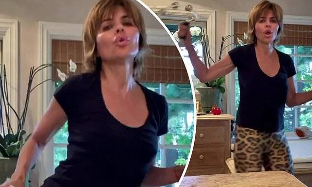 Lisa Rinna - Lisa Rinna rocks out with tambourines as she dances and lip-syncs to Stevie Nicks' Edge Of Seventeen - dailymail.co.uk