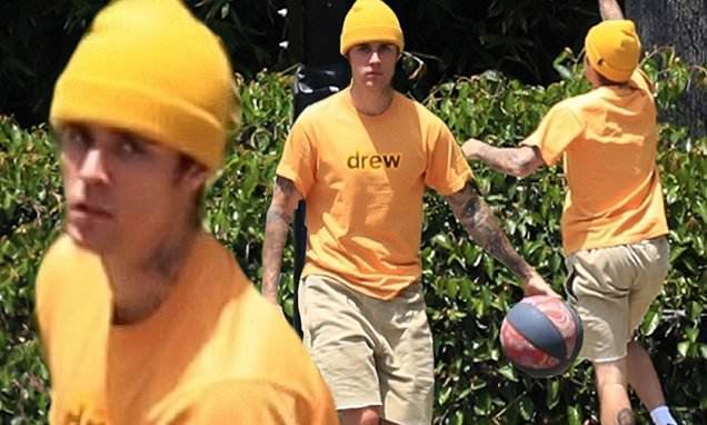 Justin Bieber - Hailey Baldwin - Justin Bieber sports his Drew clothing while spending his Saturday shooting hoops alone - dailymail.co.uk - Los Angeles - Canada