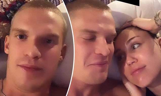 Cody Simpson and Miley Cyrus play 'never have I ever' as they lie in bed together in Instagram clip - dailymail.co.uk - Los Angeles - Australia - city Cody, county Simpson - county Simpson