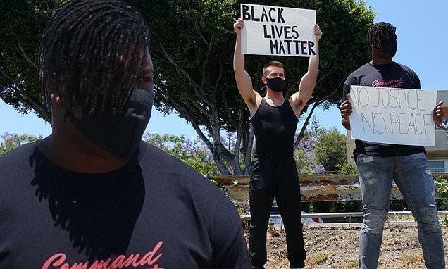 NFL player Ryan Russell joins a Black Lives Matter protest with his boyfriend Corey O'Brien - dailymail.co.uk - county George - Jordan - city Pasadena - county Floyd - city Minneapolis, county Floyd