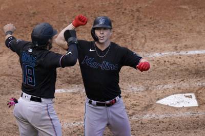 Dickerson homers as Marlins beat Cubs 5-1 in playoff opener - clickorlando.com - city Chicago - city Sandy