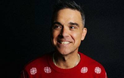 Tyson Fury - Robbie Williams - Rod Stewart - Robbie Williams tackles coronavirus on new festive single ‘Can’t Stop Christmas’ - nme.com - county Bryan - county Adams - city Santa - county Stewart