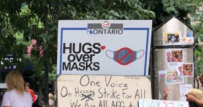 3 charged after Hugs Over Masks protest at Hamilton city hall - globalnews.ca - city Hamilton