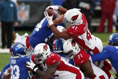 Murray throws TD, Cards end 3-game skid, beat red-hot Giants - clickorlando.com - New York - state New Jersey - state Arizona - county Rutherford - Kenya