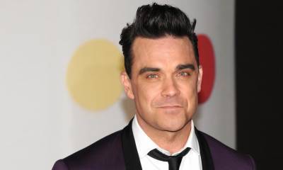 Robbie Williams - Robbie Williams ‘almost died’ from mercury poisoning - us.hola.com