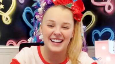 JoJo Siwa on New Holiday Music, Recovering From COVID-19 and Her Recent Breakup (Exclusive) - etonline.com - city Santa Claus