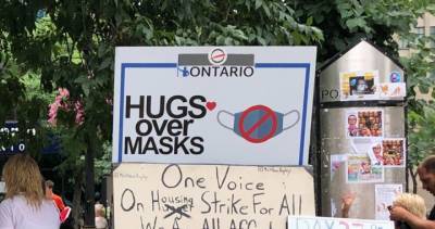 13 ‘Hugs Over Masks’ protestors charged after another demonstration at Hamilton city hall - globalnews.ca - city Hamilton - county Hamilton