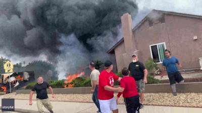 VIDEO: Bystanders rescue woman from burning home after plane crashes, killing 2 in SoCal - fox29.com - county San Diego