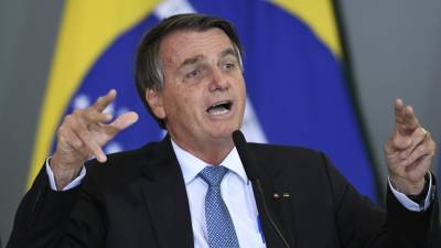 Jair Bolsonaro - Bolsonaro refuses vaccine, cannot attend soccer match - rte.ie - Brazil - city Santos