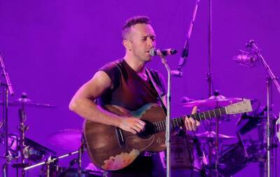 Chris Martin - Coldplay cancel two performances due to positive COVID tests - nme.com - Germany - city London