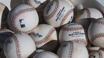AP source: MLB slightly deadening ball amid HR surge - clickorlando.com - New York - county Major