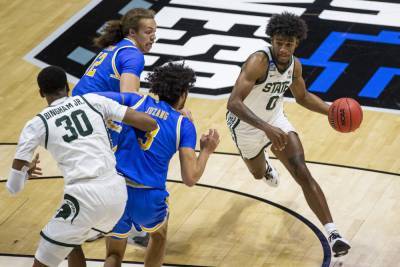 UCLA beats Michigan St 86-80 in overtime in First Four game - clickorlando.com - state Indiana - state Michigan - county Riley - county Lafayette