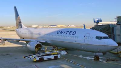 United Airlines flight diverted after man allegedly bites passenger’s ear, police say - fox29.com - city Chicago, state Illinois - state Illinois - state New Jersey - county Miami - state South Carolina - city Newark - Charleston, state South Carolina