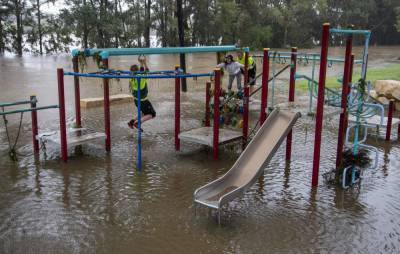 Scott Morrison - Dozens of towns isolated by flooding in Australian state - clickorlando.com - Australia - city Canberra