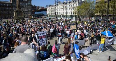 Hundreds of Anti-vax protesters descend on Glasgow’s George Square claiming Covid isn't real - dailyrecord.co.uk - Scotland - city Glasgow