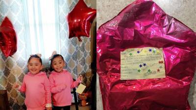 Stranger surprises twins with gifts, a puppy after wish-list balloon to Santa found 650 miles away - fox29.com - state Kansas - city Santa