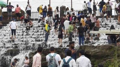 Maharashtra: Over 400 people fined in this district for weekend monsoon tourism amid Covid - livemint.com - India - city Pune