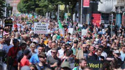 Anti-vaccine passport protests take place in Dublin and Belfast - rte.ie - Usa - Ireland - city Dublin - Poland - city Belfast