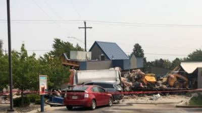 Driver charged after dump truck plows into cars, buildings - fox29.com - state Washington