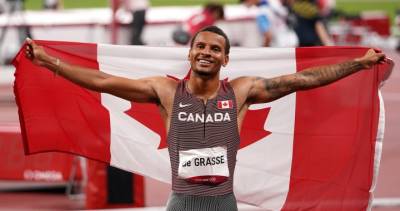 Andre De-Grasse - Aaron Brown - Andre De Grasse wins Olympic gold in 200-metre race - globalnews.ca - Usa - city Tokyo - Canada