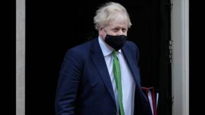Boris Johnson - U.K. drops COVID-19 restrictions, scraps mandatory face masks - globalnews.ca - Britain