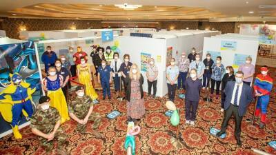 Vaccine centre staff swap scrubs for superhero costumes - rte.ie