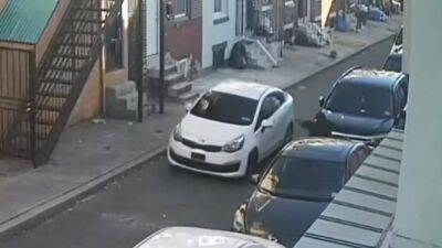 Video: Masked shooter fires gunshots into moving car on North Philadelphia street, police say - fox29.com