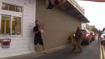 Video shows Florida man using 1-year-old as human shield during standoff, Flagler sheriff says - fox29.com - state Florida - county Flagler - county Lane