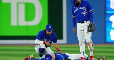 Blue Jays - George Springer - Bo Bichette - George Springer carted off field with injury in Blue Jays playoff game against Mariners - globalnews.ca - city Seattle - county Centre - county Rogers - city Santiago
