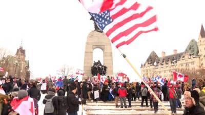Abigail Bimman - Trucker protests: Protesters vow to protect National War Memorial in Ottawa after removal of fencing - globalnews.ca - city Ottawa