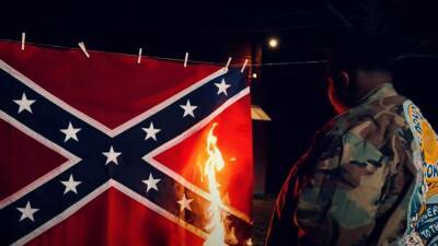 Louisiana Senate candidate burns Confederate flag in latest ad - fox29.com - Usa - state Louisiana - city New Orleans - county Chambers