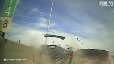 Video captures car rear-ending pulled over driver along Colorado highway; trooper walks away just in time - fox29.com - state Colorado