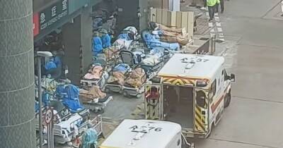 Overrun Hong Kong hospitals forced to leave Covid patients on beds in car parks - dailystar.co.uk - China - Hong Kong - city Hong Kong