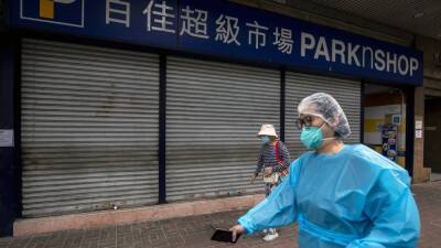 Carrie Lam - Hong Kong retail chains ration goods amid Covid surge - rte.ie - Hong Kong - city Hong Kong