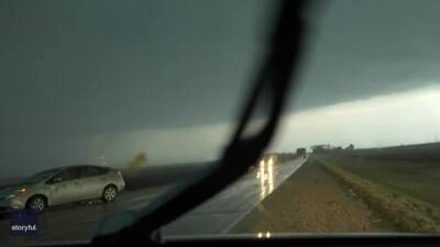 Watch: Storm chaser video shows moment lightning strikes car during Iowa tornado - fox29.com - state Iowa