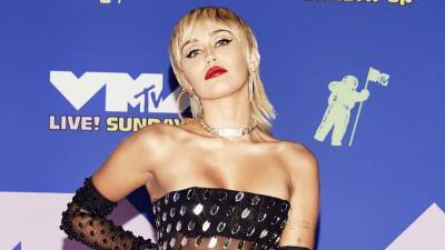 Miley Cyrus - Miley Cyrus Tests Positive for COVID-19: 'I Am Feeling Fine so Don't Worry About Me!' - etonline.com