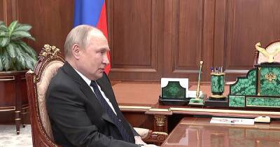 Vladimir Putin - Sergei Shoigu - 'Bloated' Vladimir Putin sparks health fears as he's seen gripping table for 'support' - dailystar.co.uk - state Texas - Russia - Ukraine - city Mariupol