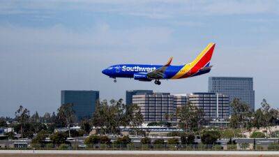 Airlines - Southwest spending over $2 billion for faster internet, outlets, overhead bins - fox29.com - county Orange - city Santa Ana