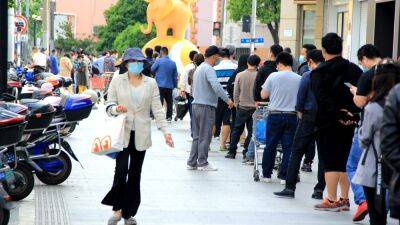 Shanghai locals allowed outside for first time in weeks - rte.ie - China - city Shanghai - city Beijing, China