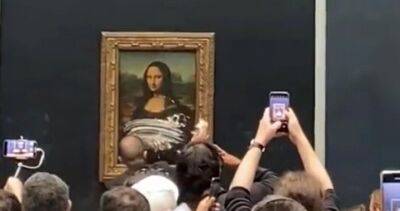 Man in disguise throws cake at Mona Lisa painting in Louvre Museum - globalnews.ca - Italy