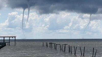 Triple threat: Watch as 3 waterspouts swirl off the Alabama coast - fox29.com - county Bay - state Mississippi - state Alabama - county Mobile