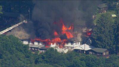 Firefighters battle 2-alarm fire at Camp Airey in Thurmont - fox29.com - county Frederick