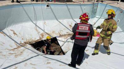 Man found dead after being swept into sinkhole that opened up underneath pool - fox29.com - Israel