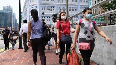 COVID-19: Singapore issues new mandatory mask rules - livemint.com - Singapore - India - city Singapore