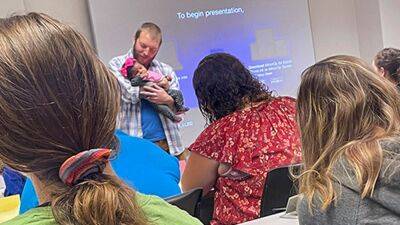 Professor comforts student’s crying baby while teaching class - fox29.com - state South Carolina - county Greenwood